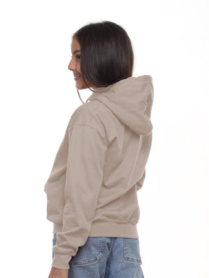 Buzo niño con capucha color nude, vista 2 · Aritex Colombia