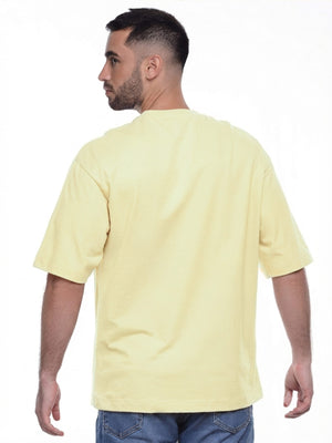 Camiseta hombre oversize 230g color amarillo mantequilla, vista 2 · Aritex Colombia