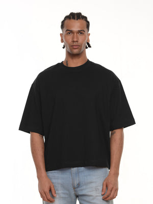 Camiseta hombre boxy fit color negro · Aritex Colombia