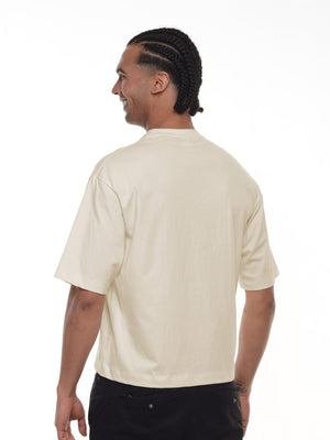 Camiseta hombre boxy fit color vainilla, vista 2 · Aritex Colombia